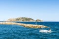 Fisherman sailing in the Medes islands at the Costa Brava, Spain