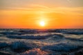 Fisherman sailing with his boat on beautiful sunrise over the sea Royalty Free Stock Photo