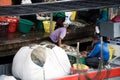 Fisherman selling fish at the pier