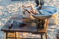 Fisherman selling fish straight from boat after morning catch