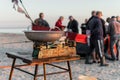 Fisherman selling fish straight from boat after morning catch