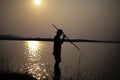 Fisherman silhouette.