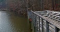 Fisherman in small motorboat trolls the banks of lake Allatoona Royalty Free Stock Photo