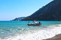 Fisherman on a small fishing boat at the mediterranean coast