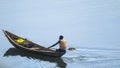 Fisherman on small kayak on a lake in Rwanda
