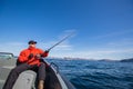 Fisherman sportsman sunglasses fishing in the sea.