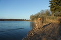 Fisherman standing on the riverside and trying to catch a fish. Sport, recreation