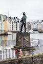 A Fisherman Statue Beside the Alesund Waterfront