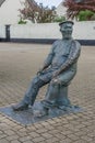 Fisherman statue in the harbour.UK