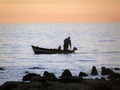 Fisherman on sunset Royalty Free Stock Photo