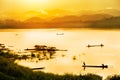 Fisherman in sunset background Royalty Free Stock Photo