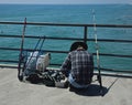 Fisherman swimmers pier ocean