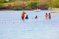Fisherman teaches children to use net