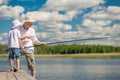 The fisherman teaches his son to fish Royalty Free Stock Photo