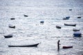 Fisherman tending to his boat