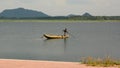 Fisherman on a traditional boat. Kataragama lake. Sri Lanka