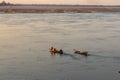 Fisherman on the traditional boat  on the Mekong River in Cambodia Royalty Free Stock Photo