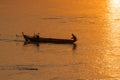 Fisherman on the traditional boat  on the Mekong River in Cambodia Royalty Free Stock Photo