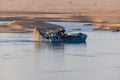 Fisherman on the traditional boat  on the Mekong River in Cambodia Royalty Free Stock Photo