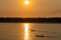 Fisherman on the traditional boat  on the Mekong River in Cambodia Royalty Free Stock Photo