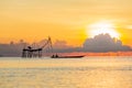 Fisherman on a traditional wooden boat during sunrise Royalty Free Stock Photo