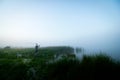 Fisherman trying to do a perfect cast, throwing lure. Spining fishing, angling, catching fish. Hobby and vacation Royalty Free Stock Photo