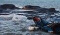 A fisherman on waves Royalty Free Stock Photo