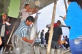 Fisherman is weighing tuna to sell to the market Royalty Free Stock Photo