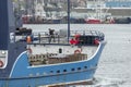 Fisherman working on lines on bow of commercial fishing vessel Sea Watcher II