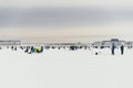 Fishermans on ice. Mans fishing on ice on gulf on Finland near Kronshtadt, Saint Petersburg, Russia, 03 February 2018