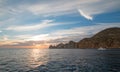 Fishermans sunrise view of fishing boats going out for the day past Lands End in Cabo San Lucas in Baja California Mexico Royalty Free Stock Photo