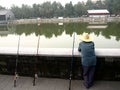 Fishermen along a canal around Forbidden City