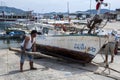 Fishermen anchor their boat boat in dry dock at the marina in the Mediterranean town of Kas in Turkey.