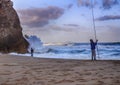 Fishermen on the Atlantic coast during a storm, Portugal, May, 2017