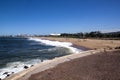 Fishermen on Beach Against Durban City Skyline Royalty Free Stock Photo