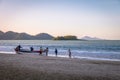 Fishermen at Beach with Ilha das Cabras Island on background - Balneario Camboriu, Santa Catarina, Brazil