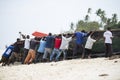 Fishermen on the beach of Zanzibar Island. Royalty Free Stock Photo