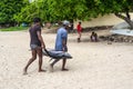 Fishermen and big tuna fish on the Tamarin beach