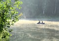 Fishermen on a boat on the lake