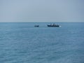 Fishermen on a boat in the middle of the Black Sea.