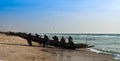 Fishermen with the boat on the Nouakchott beach Mauritania Royalty Free Stock Photo