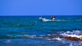 Fishermen boat sails from the small port of Givat Olga Hadera Israel Royalty Free Stock Photo