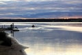 Fishermen in boat on sea before sunrise Royalty Free Stock Photo