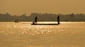 Fishermen in the boat sunrise Royalty Free Stock Photo