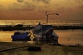 Fishermen boat at the small port of Givat Olga Hadera Israel in sunset
