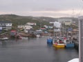 Fishermen boats and village Royalty Free Stock Photo