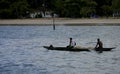 Fishermen canoe at sea in salvador