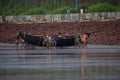 Fishermen carring out their boat