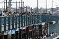 Fishermen cast their rods from Galata Bridge in Istanbul. Royalty Free Stock Photo