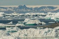 Fishermen check their spots among the icebergs in Disko Bay, Ilulissat, Greenland